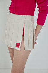 EASY ACCESS PLEATED SKIRT